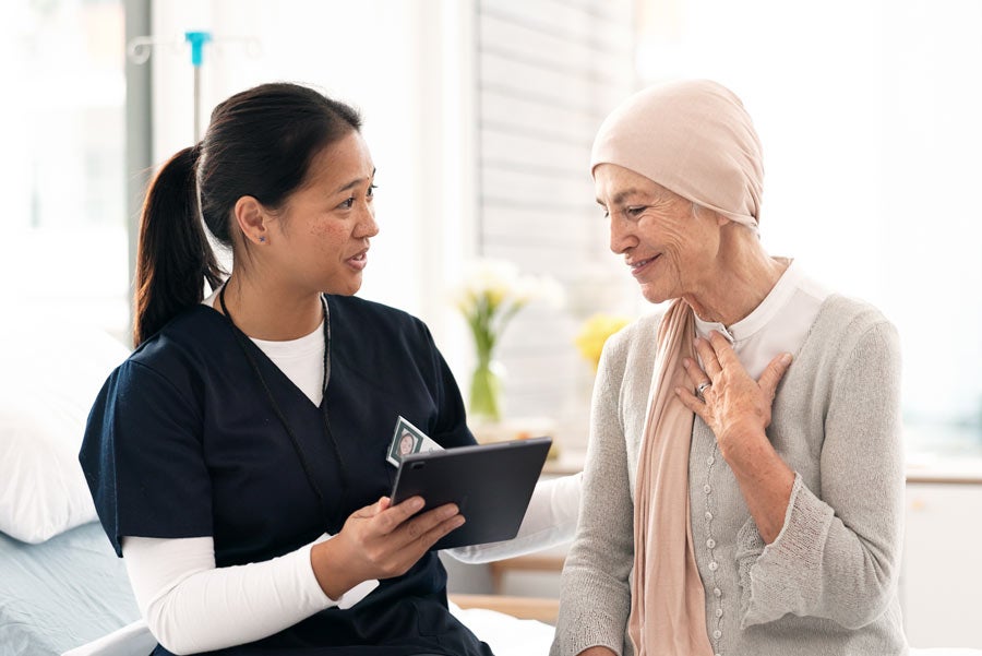 Senior woman talking with doctor